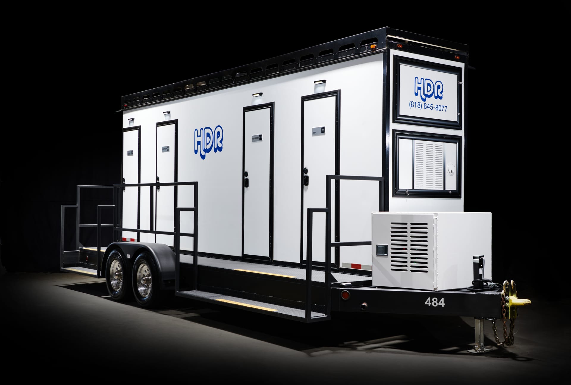 HDR 4-stall luxury restroom trailer at night